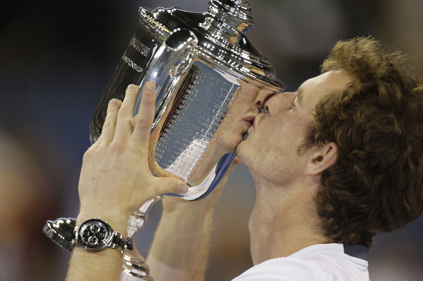 Andy Murray kisses the US Open trophy as he celebrates winning his first Grand Slam, September 10 2012
