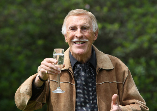 Bruce Forsyth at his home in 2011 in Wentworth, as he poses for photographers after he received a Knighthood in the Queen's Birthday Honours list.