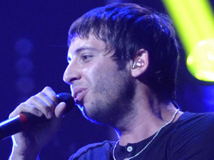 Example performing at the iTunes Festival held at the Roundhouse