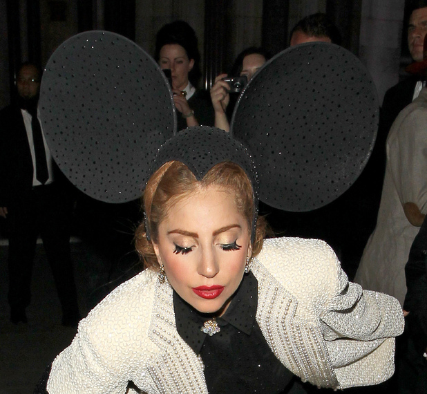 Lady Gaga wearing oversized Mickey Mouse inspired ears
London Fashion Week Spring/Summer 2013 - Philip Treacy - Outside Departures
London