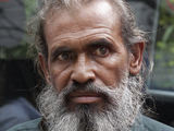 Bangladeshi man Moslemuddin Sarkar, 52, who had been missing since 1989, arrives at Dhaka airport, Bangladesh, upon returning home