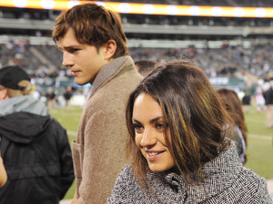 Ashton Kutcher and Mila Kunis
during the Houston Texans at the NY Jets on Monday October 8, 2012 at Met Life Stadium in East Rutherford,
New Jersey