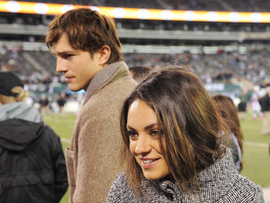 Ashton Kutcher and Mila Kunis
during the Houston Texans at the NY Jets on Monday October 8, 2012 at Met Life Stadium in East Rutherford,
New Jersey