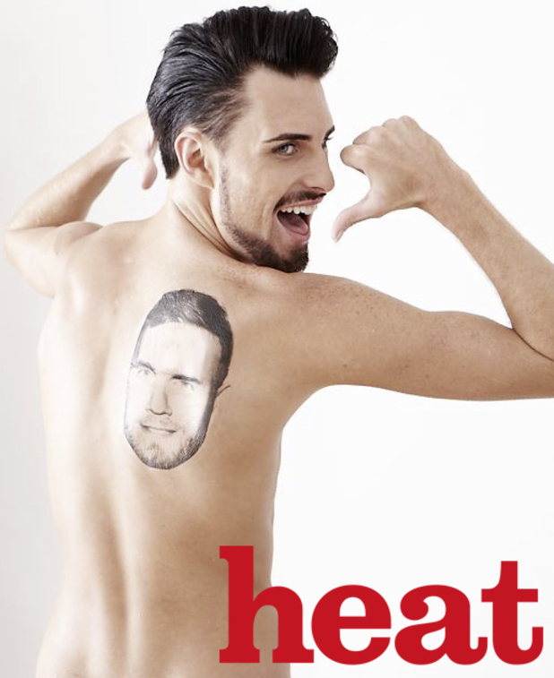 X Factor star Rylan Clark shows off his Gary Barlow tattoo.