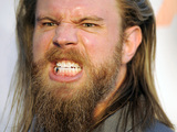 Ryan Hurst, a cast member in "Sons of Anarchy," poses for photographers at a screening of the fourth season premiere of the television series, Tuesday, Aug. 30, 2011, in Los Angeles