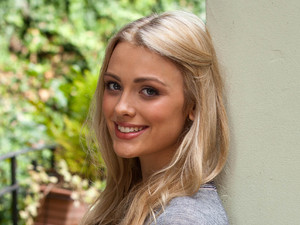 Wallis Day as Holly Cunningham