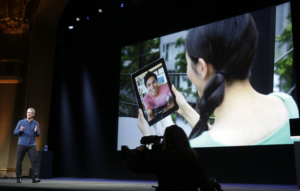 Apple CEO Tim Cook speaks about the iPad's impact on the market place during the introduction of the iPad mini