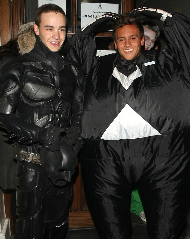 Liam Payne of One Direction dressed as Batman and Tom Daley in a fat skeleton costume at Funky Buddha nightclub for a Halloween party.