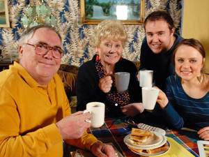 Jack Duckworth [Bill Tarmey], Vera Duckworth [Liz Dawn], Molly Compton [Vicky Binns] and Tyrone Dobbs [Alan Halsall] toast to Jack and Vera's new life in 