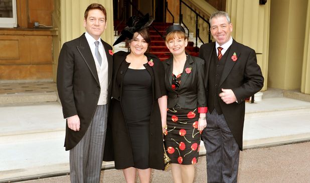 Actor Kenneth Branagh arrives with his wife Lindsay his brother Bill and sister-in-law Joyce, to be Knighted by Queen Elizabeth II at an Investiture Ceremony, at Buckingham Palace in central London.