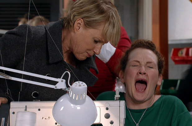 8001: Sally helps an agonised Fiz free her hand from the sewing machine which was meant to be switched off
