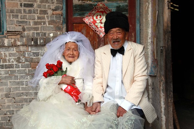 Chinese couple - combined age of 204 - pose for wedding photo