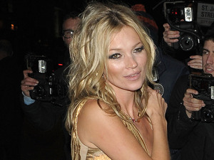 Kate Moss in a gold dress at party for her new book 'The Kate Moss Book' at 50 St James
London, England