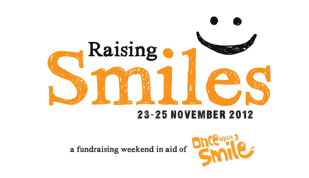 Raising Smiles logo
