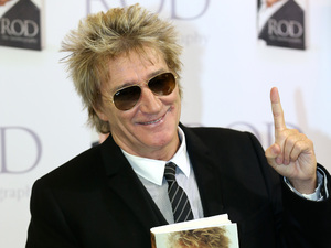 Rod Stewart greets fans at a book signing for Rod: The Autobiography.