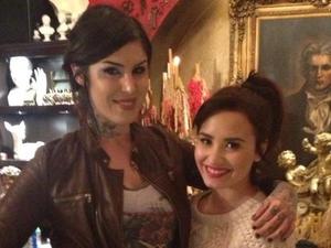Demi Lovato hugs Kat Von D after getting a tattoo