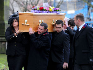 Pall bearers carry the coffin of Coronation Street star Bill Tarmey