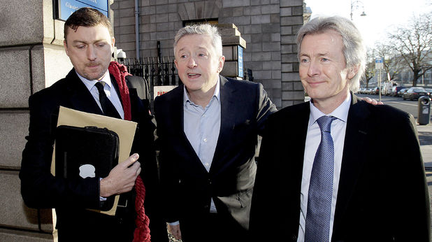Louis Walsh on his way into court for his defamation case against Rupert Murdoch's News Group Newspapers (28/11/12)