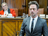 6427: Cameron struggles standing in court to defend Chas. He later tells the barrister he'd like to say something, stating that he knows Chas didn't kill Carl