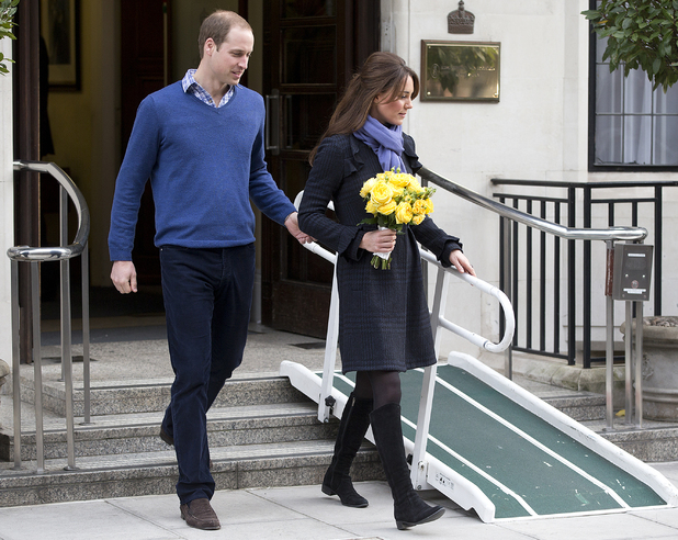 Britain's Prince William stand next to his wife Kate, Duchess of Cambridge as she leaves the King Edward VII hospital in central London, Thursday, Dec. 6, 2012. Prince William and his wife Kate are expecting their first child, and the Duchess of Cambridge was admitted to hospital suffering from a severe form of morning sickness in the early stages of her pregnancy. (AP Photo/Alastair Grant)
