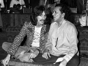 Ravi Shankar and George Harrison of The Beatles photographed together in 1974.