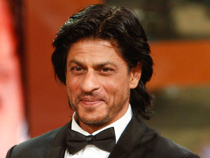  Shah Rukh Khan poses with his trophy after receiving award for his lifetime career during the 11th Marrakech International Film Festival in Marrakech, Morocco, Friday, Dec. 2, 2011. The Festival runs through Dec. 2-10