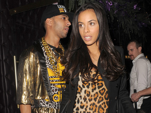 Rochelle Humes and husband Marvin Humes leaving Freedom Bar in Soho wearing fancy dress costumes. Marvin was dressed as MC Hammer, complete with gold chains and cheesy tracksuit, and Rochelle was dressed as Scary Spice Mel B, in a tiger catsuit and holding an afro style wig. Marvin was very protective of his newly pregnant wife, who was sporting a little baby bump, and ushered her into a waiting car.
London, England - 19.12.12