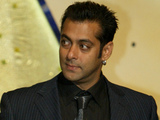 Bollywood actors Shilpa Shetty, left, and Salman Khan, right, pose with the awards for best actor at the 10th Rajiv Gandhi Awards in Mumbai, India, Sunday, Aug. 12, 2007.