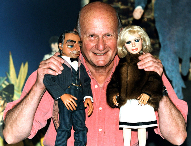 The Creator of the TV show 'Thunderbirds' Gerry Anderson says farewell to two of his most famous puppets, Lady Penelope and Parker at Planet Hollywood in London (2001)
