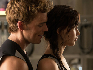 'The Hunger Games: Catching Fire' still: Sam Claflin and Jennifer Lawrence