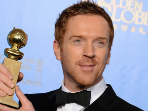 Damian Lewis poses with the award for best performance by an actor in a television series  drama for ÂHomeland backstage at the 70th Annual Golden Globe Awards