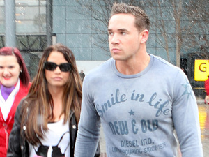 Katie Price and her new husband Kieran Hayler arrive back in the UK at Heathrow Airport, after their recent wedding.