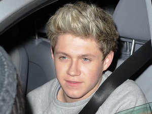'One Direction' arriving at Heathrow Airport
Featuring: Niall Horan
Where: London, United Kingdom
When: 21 Dec 2012
Credit: WENN.com