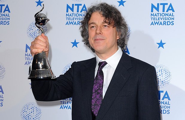 Alan Davies poses with the Comedy Panel Award for 'QI' in the press room at the 2013 National Television Awards at the O2 Arena, London.