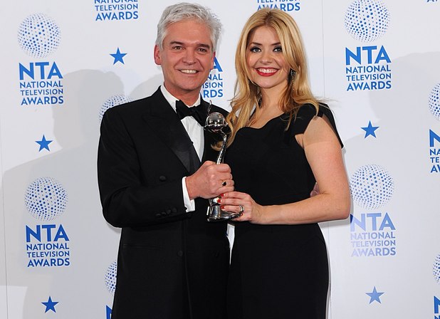 Philip Schofield and Holly Willoughby with the award for Best Factual Programme for 'This Morning', in the press room at the 2013 National Television Awards at the O2 Arena, London.