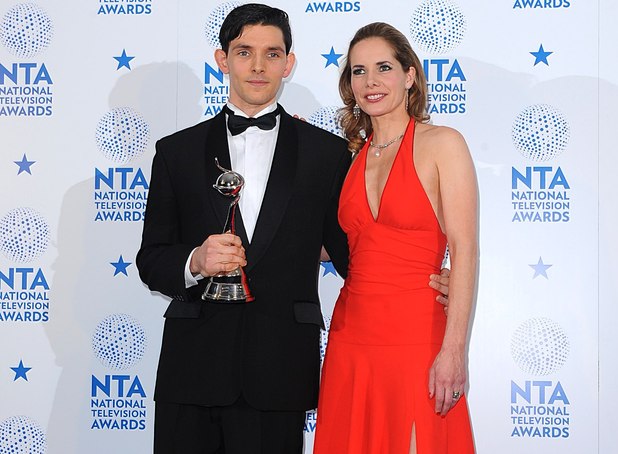 Colin Morgan with his Drama Male Performance Award and presenter Darcey Bussell in the press room at the 2013 National Television Awards at the O2 Arena, London.