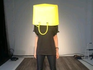 Victoria Beckham goes delirious at New York Fashion Week and wears a bag on her head