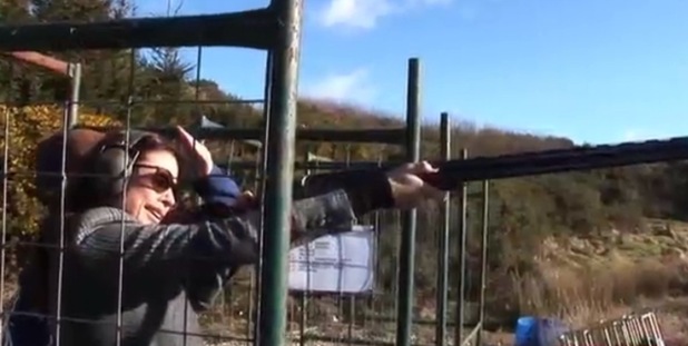 Melanie Sykes trying her hand at clay pigeon shooting with Peter Wilson.