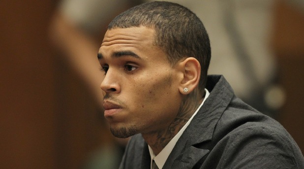 Chris Brown appears in court for a probation progress report hearing on February 6, 2013 in Los Angeles