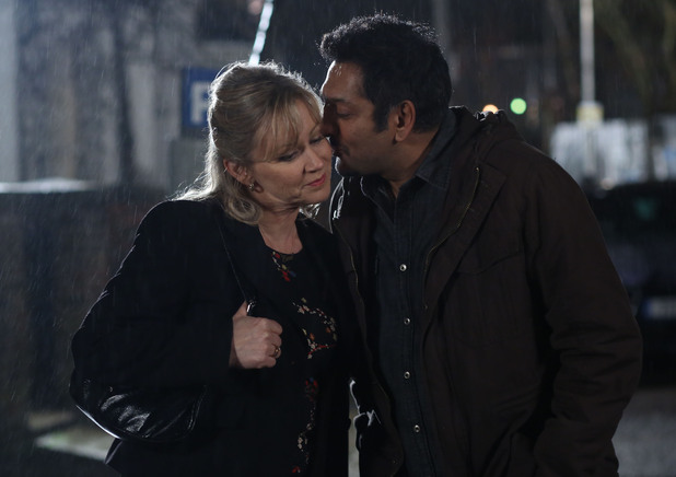 Masood follows after Carol and charms her.