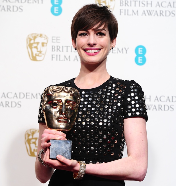 BAFTA 2013: Anne Hathaway with the award for Best Supporting Actress for 'Les Miserables'.