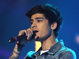 Zayn Malik of One Direction on stage during the 2012 Capital FM Jingle Bell Ball at the O2 Arena, London.