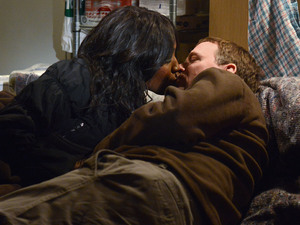 Ian and Denise share a kiss.