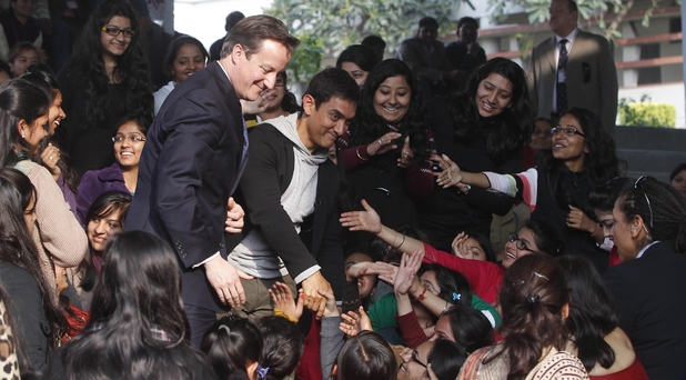 David Cameron and UNICEF ambassador Aamir Khan meet students at the Janaki Devi Memorial College in New Delhi, India