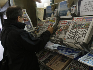 Copies of newspapers on sale