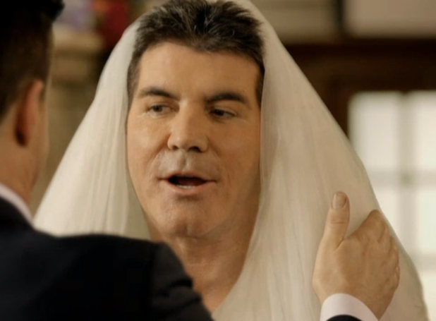 http://i2.cdnds.net/13/11/618x455/showbiz-comic-relief-simon-cowell.jpg