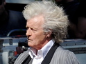 The Blade Runner actor is seen with Ryan Kwanten on set with a large wig.