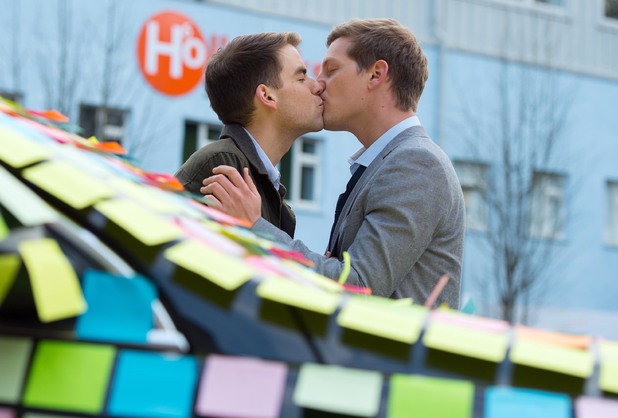 Doug and John-Paul share a kiss.