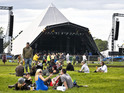 Glastonbury festival-goers at the Pyramid Stage