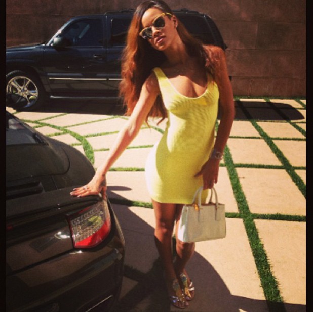 Rihanna in a yellow dress